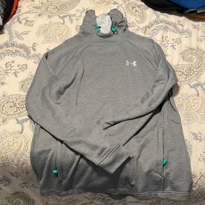 Grey teal under armor runners pull over